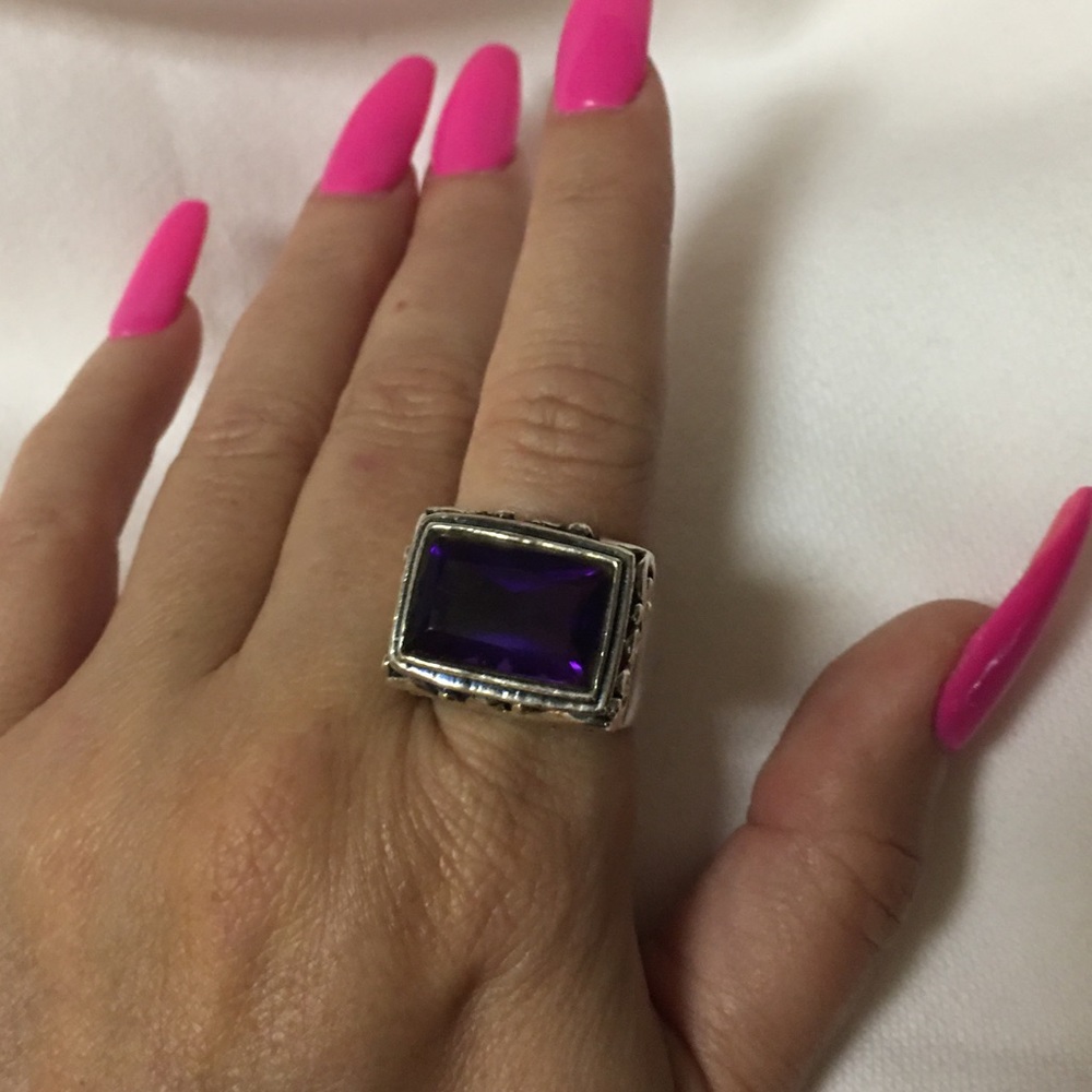 Sterling silver ring with large purple stone